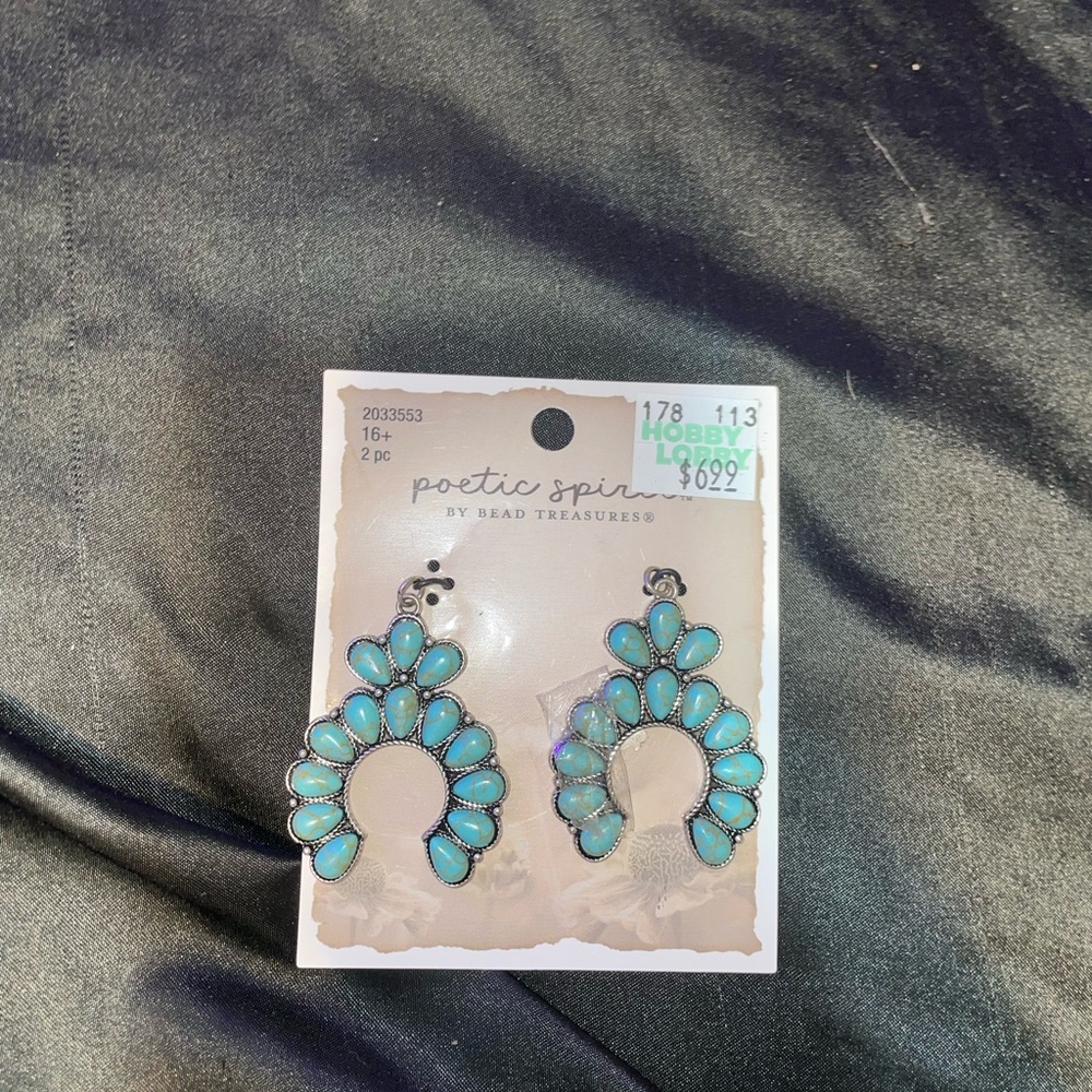 Hobby lobby, blue, silver, black charms or like you can hang it on a key chain